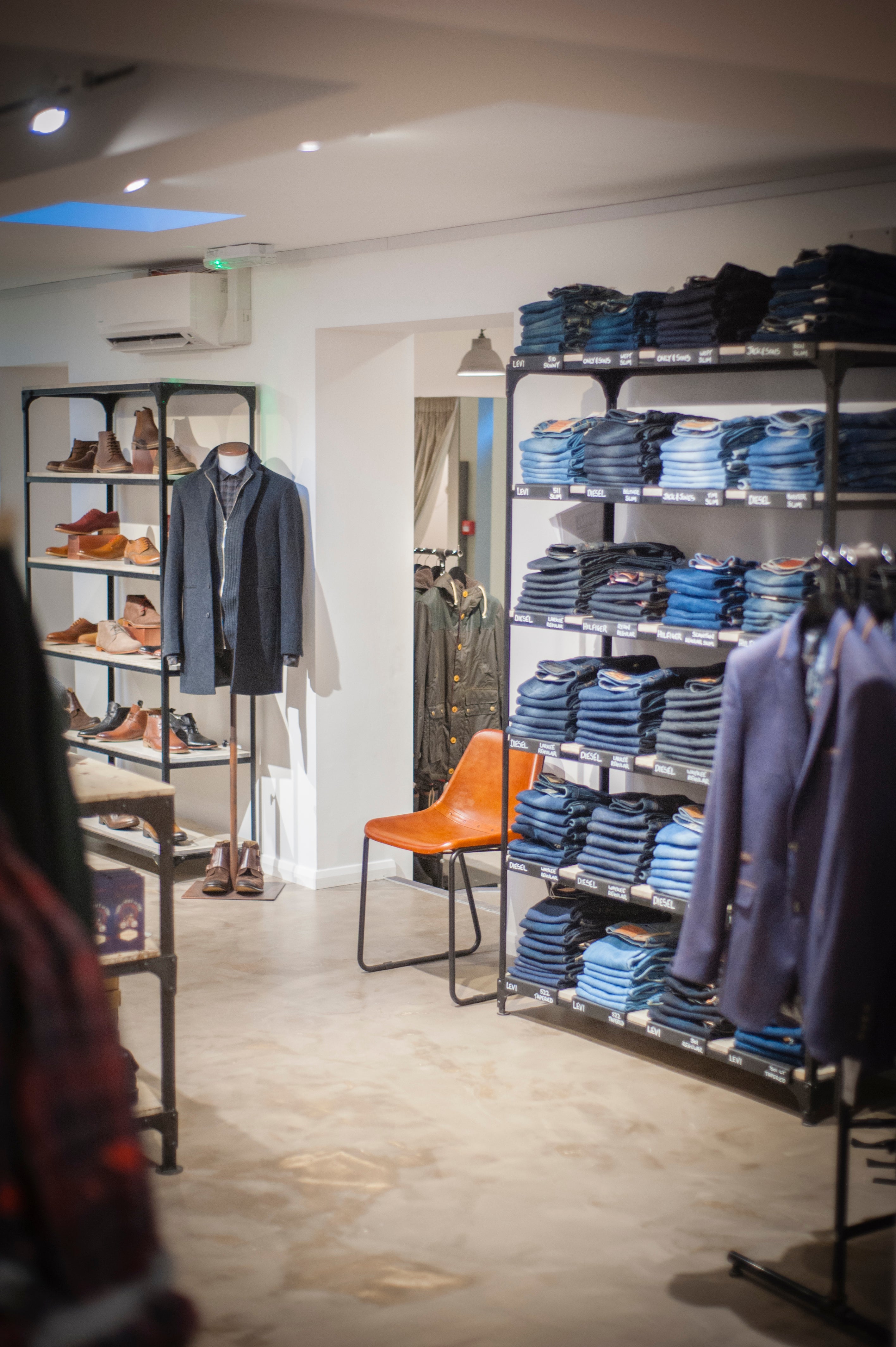 Customer space, menswear, retail interior design, jeans display