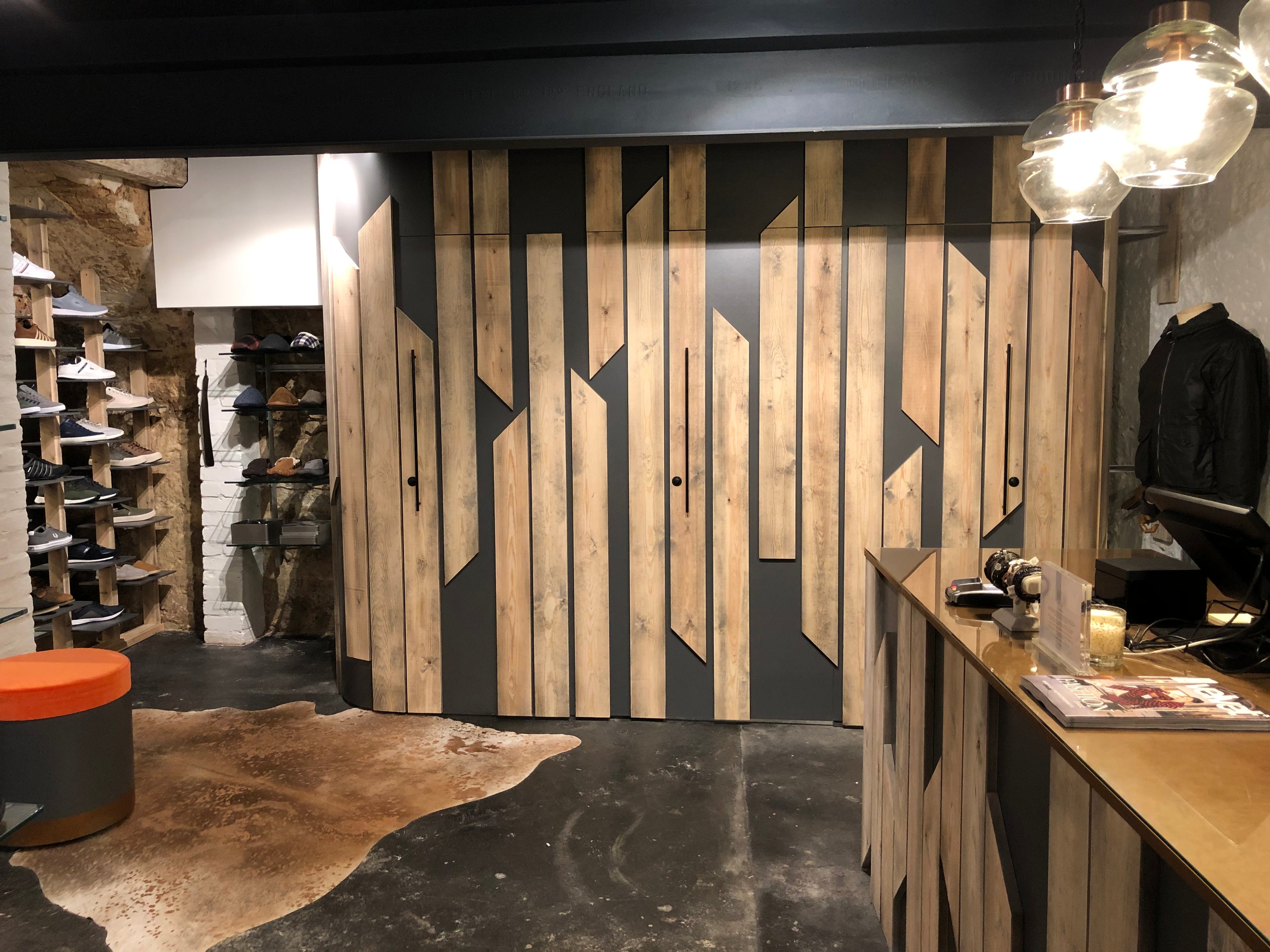 Wooden panelling application onto the changing room and store furniture at Javelin, Bury St Edmunds, Suffolk