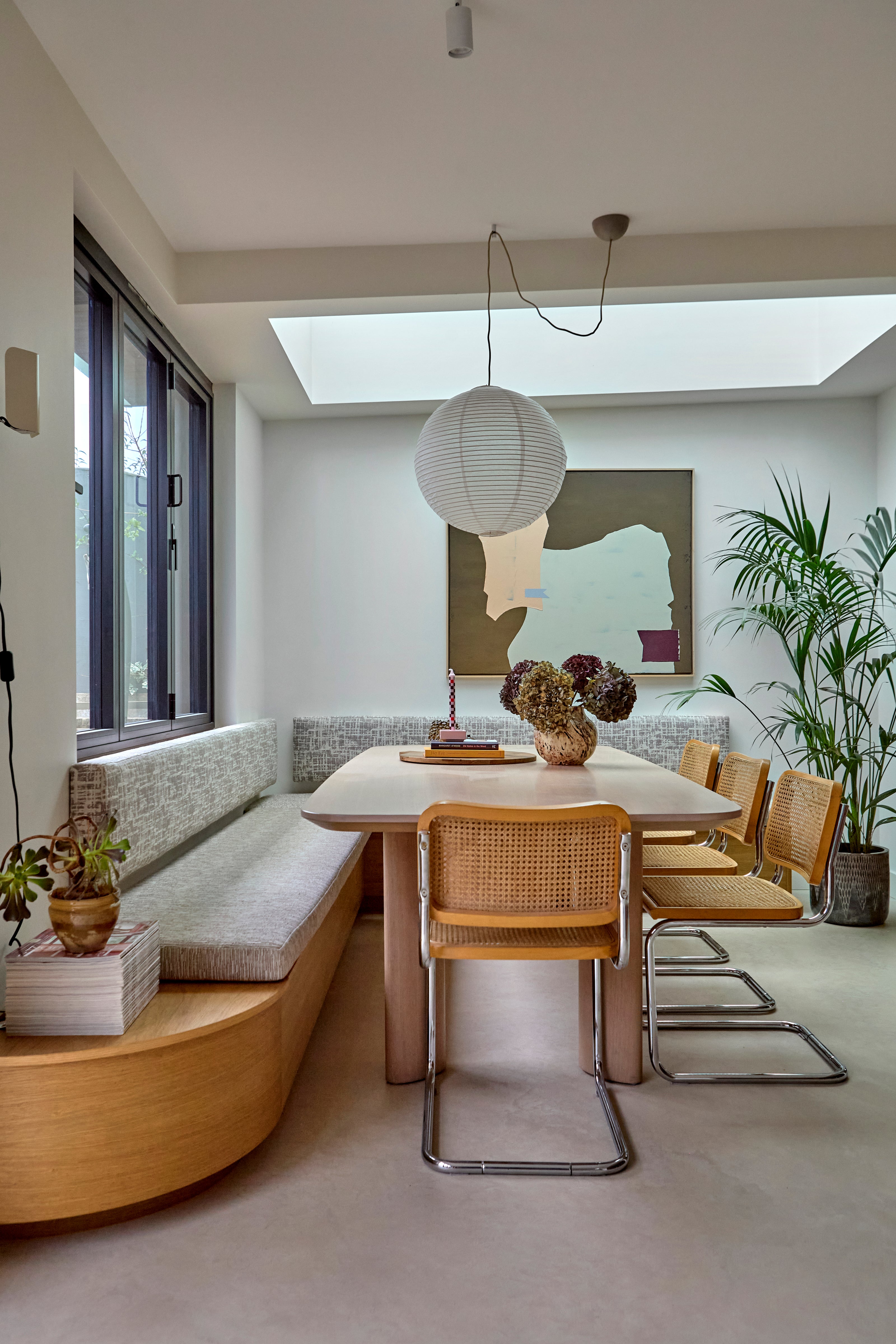 Banquette designed by House of Bo and made by Larke valley. HK Living artwork. Bespoke upholstered banquette