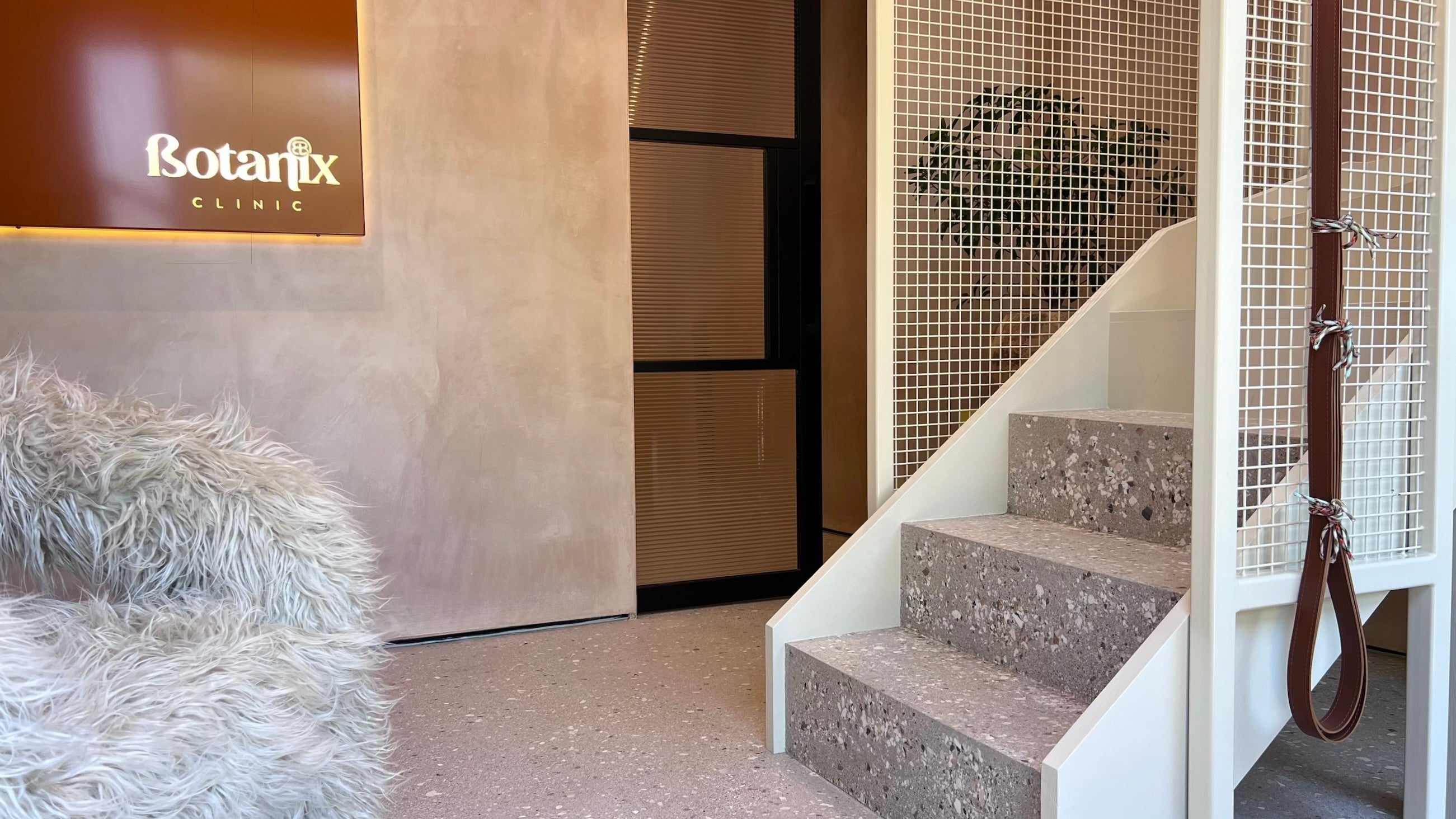The lit up Botanix sign in a soft terracotta colour is seen already through the glazed entrance door which also has Botanix B logo. The design throughout is sophisticated and classy just like the beautiful founder Katie. 