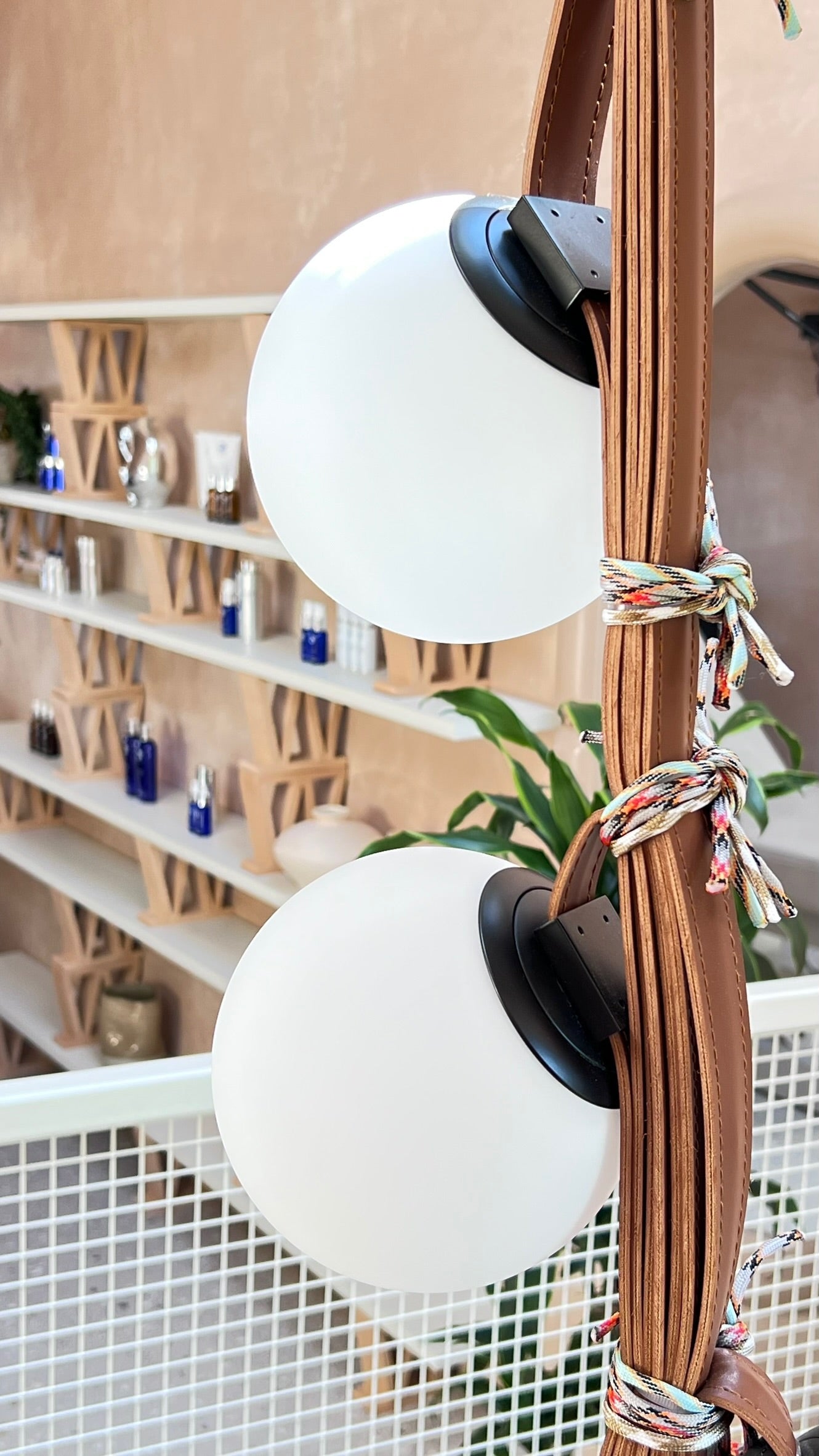 Floor to ceiling customised glass globe chandelier